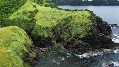 Cliffs-And-Headlands-Jutting-Into-The-Sea-In-Baras,-Catanduanes,-Philippines---aerial-shot