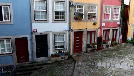 Iconic-colorful-houses-on-cobbled-street-in-Largo-da-Pena-Ventosa-in-Porto-city-centre