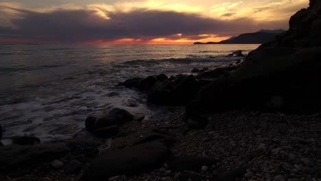 Dramatic-Mediterranean-Romance:-Sunset's-Orange-Dusk-Paints-the-Sky-and-Sea-Surface---A-Mesmerizing-Coastal-Evening