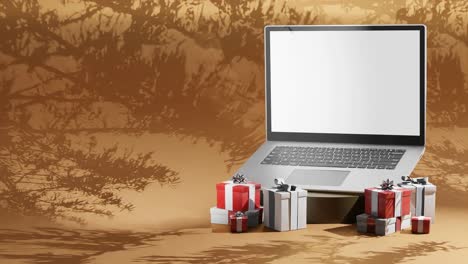 Christmas-Sales-Laptop-Illuminated-screen-with-presents,-Animated-tree-silhouette