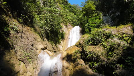 Flying-Towards-The-Waterfalls-In-The-Forest-On-A-Sunny-Day-In-Summer-In-Sumba-Island,-Indonesia