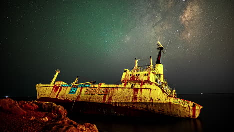 The-Milky-Way-passes-by-in-a-starry-sky-above-the-Edro-III-shipwreck-on-a-rocky-coast-of-Cyprus