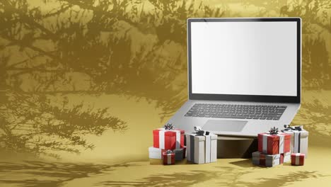 Weihnachtsferien-Laptop-Umgeben-Von-Geschenken-Auf-Gelbem-Hintergrund