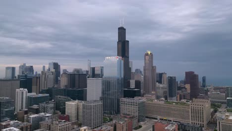 Downtown-Chicago-USA-on-Cloudy-Day,-Central-Skyscrapers-and-Traffic,-Drone-Aerial-View