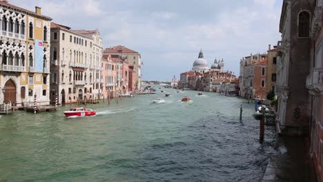 Traffic-on-Grand-Canal-in-Venice-from-the-Accademia-Bridge,-on-sunny-summer-day,-Italy