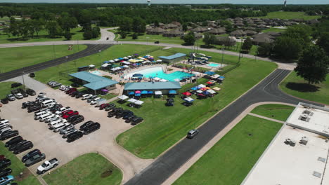 Aerial-Towards-Swimming-Pool-At-Swim-Club-In-Siloam-Springs,-Arkansas
