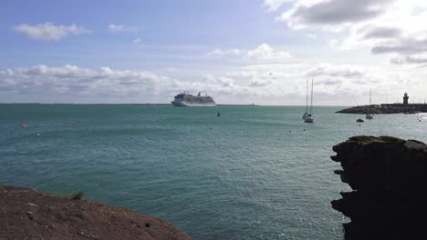 Dunmore-East-Harbour-Waterford-cruise-liner-moored-at-high-tide-autumn-day