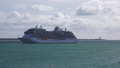 Cruise-Liner-Moored-with-Hook-Head-Lighthouse-in-Background