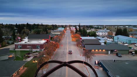 A-Slow-Reveal-Wide-Angle-Drone-Shot-of-the-Northern-Canadian-Landscape-a-Small-Rural-Town-Skiing-Fishing-Village-Main-Street-Arches-in-Asessippi-Community-in-Binscarth-Russell-Manitoba-Canada