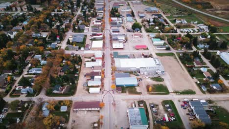 A-Wide-Angle-Drone-Shot-City-of-the-Northern-Canadian-Landscape-a-Small-Rural-Town-Skiing-Fishing-Village-Main-Street-Arches-in-Asessippi-Community-in-Binscarth-Russell-Manitoba-Canada