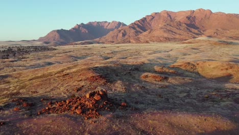 Scenic-aerial-landscape-of-the-Brandberg-mountain-at-sunrise,-Namibia