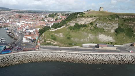 Aerial-bird's-eye-view-of-Scarborough-harbor-and-castle