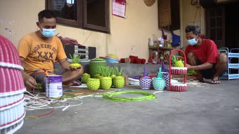 The-local-artisan-making-Cirebonese-handicrafts-from-rattan-for-tourism-destination-and-local-people-in-Java-Island,-Indonesia