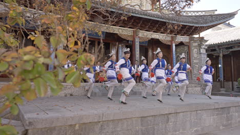 Bai-Ethnic-Minority-Group-Performing-Traditional-Dance-in-Yunnan,-China