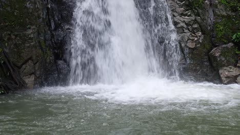 Pan-of-Bulalacao-Waterfalls-hidden-in-the-dense-jungle-of-El-Nido-in-Palawan,-Philippines,-Southeast-Asia