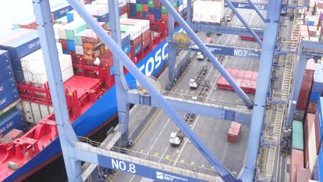 Crane-lifting-container-off-the-ship-at-berth