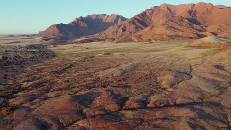 Scenic-aerial-landscape-of-the-Brandberg-mountain-at-sunrise,-Namibia
