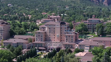 Amazing-aerial-view-of-famous-The-Broadmoor,-hotel-resort