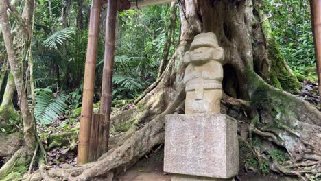 Indigenous-totem-carved-in-stone-in-the-jungle-of-San-Agustin-archaeological-park