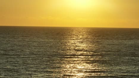 Beautiful-calm-sea-with-small-waves-during-sunset