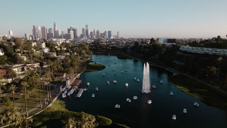 A-Cinematic-Drone-Shot-of-Echo-Park-Lake-with-Downtown-Los-Angeles-in-the-Background