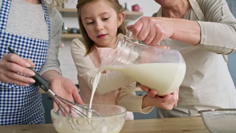 Video-of-little-girl-helping-and-pouring-milk-for-bowl