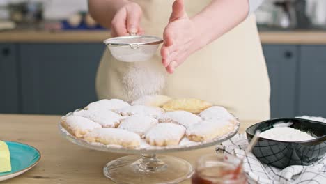 Video-of-woman-sprinkling-and-decorating-cookies-with-powdered-sugar