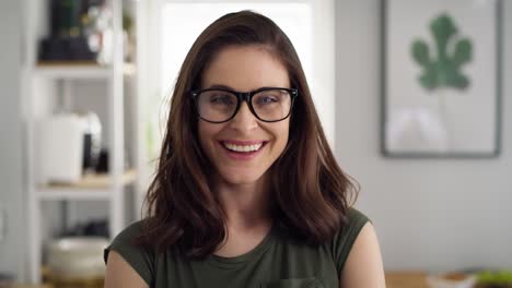 Close-up-video-portrait-of-happy-woman-with-eyeglasses