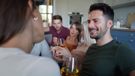 Adult-man-talking-with-girl-at-the-house-party