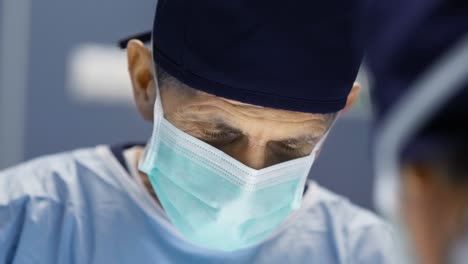 Close-up-of-surgeon-during-hard-operation