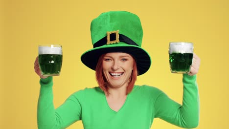 Smiling-woman-with-leprechaun's-hat-holding-full-a-beer-glass