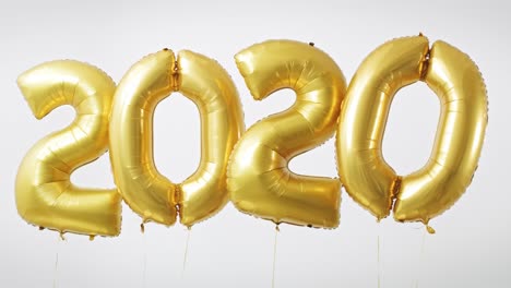 Die-Figur-„2020“-Aus-Goldenen-Luftballons