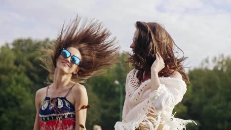 Crazy-young-women-dancing-on-fresh-air
