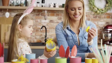 Video-of-mother-and-daughter-preparing-Easter-decorations-at-home