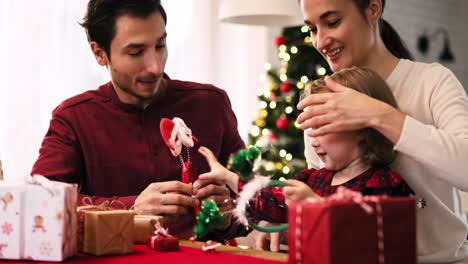 Family-with-baby-celebrating-Christmas-together