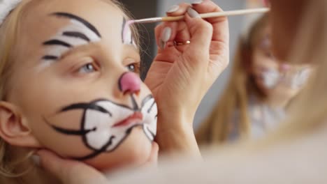 Close-up-video-of-face-painting-for-Easter-bunny