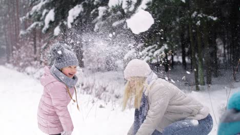 Video-of-mother-and-two-children-having-snowball-fight