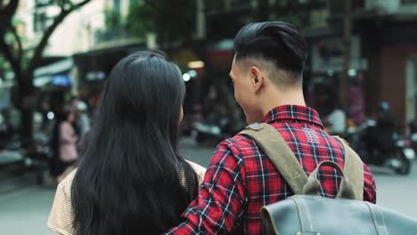 Handheld-video-shows-of-young-couple-in-the-city