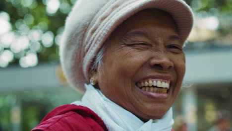 Handheld-view-of-Vietnamese-mature-woman-laughing