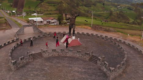 People-dancing-as-devils-as-part-of-Diablada-de-Píllaro-festival,-aerial