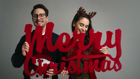 Funny-couple-wishing-Merry-Christmas-to-all