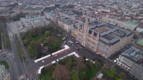 Drone-flying-close-to-Vienna-City-Hall-at-Rathausplatz-showing-architectural-details,-Vienna