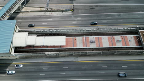 High-angle-view-of-vehicles-driving-on-multilane-expressway-in-city