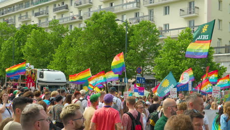 Crowds-of-people-traversing-the-streets-of-Warsaw-during-the-Equality-March---equality-parade-in-the-capital-of-Poland-Numerous-individuals-dressed-in-colorful-clothing-and-accessories-in-LGBT-colors