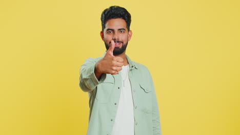 Indian-man-raises-thumbs-up-agrees-or-gives-positive-reply-recommends-advertisement-likes-good-idea