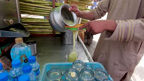 Pouring-Fresh-Sugarcane-Juice