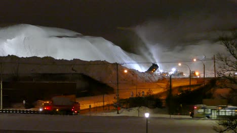 Busy-quarry-transporting-snow-through-the-night