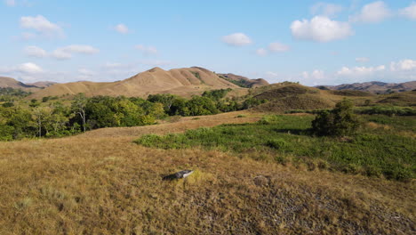 Indonesian-Nature-Landscape-With-Sloping-Mountains-During-Sunny-Day-In-Sumba-Island,-East-Nusa-Tenggara,-Indonesia
