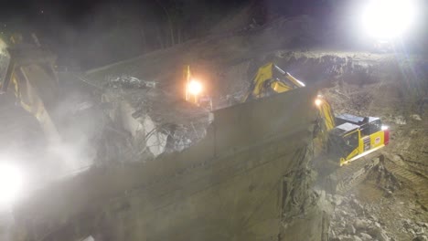 Spectacular-Drone-Flyover-Night-Demolition-Works-With-Multiple-Excavators-Using-Hydraulic-Pincers