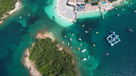 Idyllic-Mediterranean-Summer-Vacation-on-Ksamil-Islands:-Clear-Turquoise-Waters-and-Relaxing-Resorts-Await-Your-Arrival